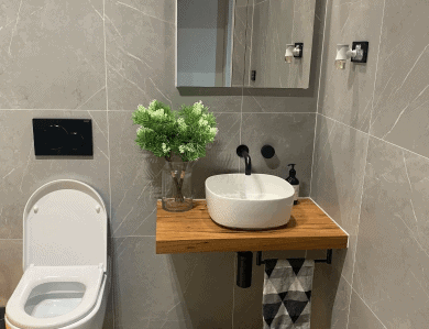 nicely installed bathroom walling grey